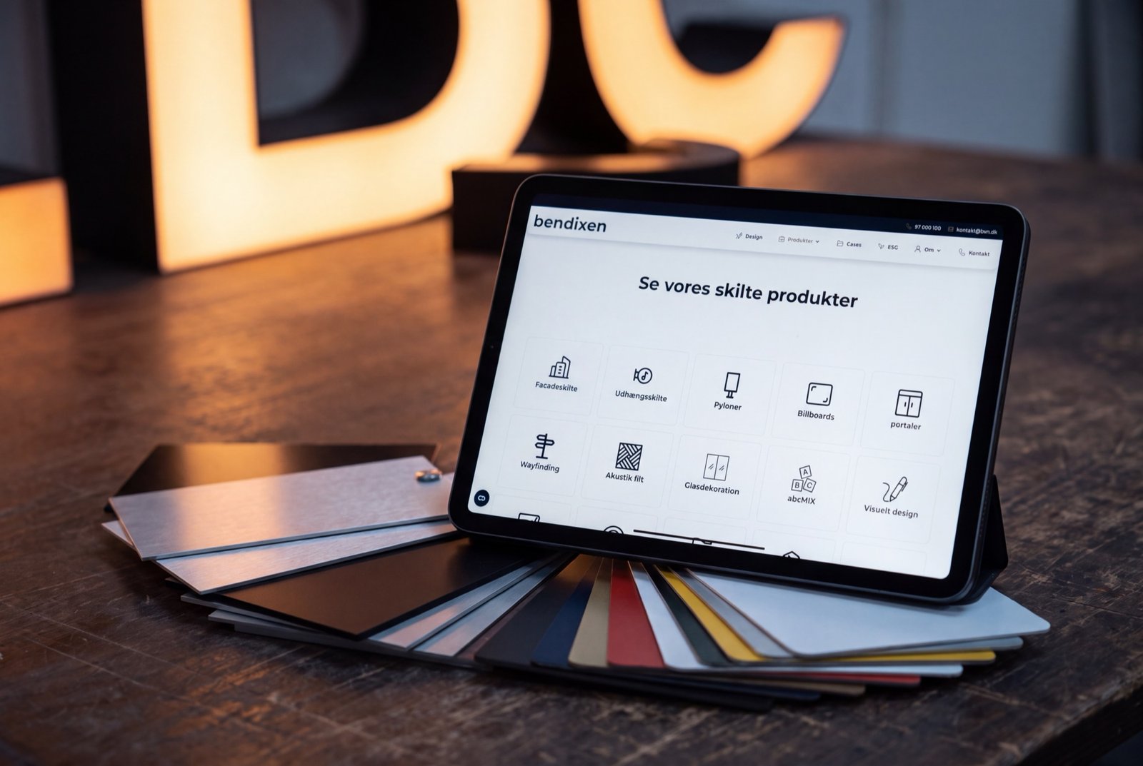 Bendixen – skilte og produkter vist på iPad