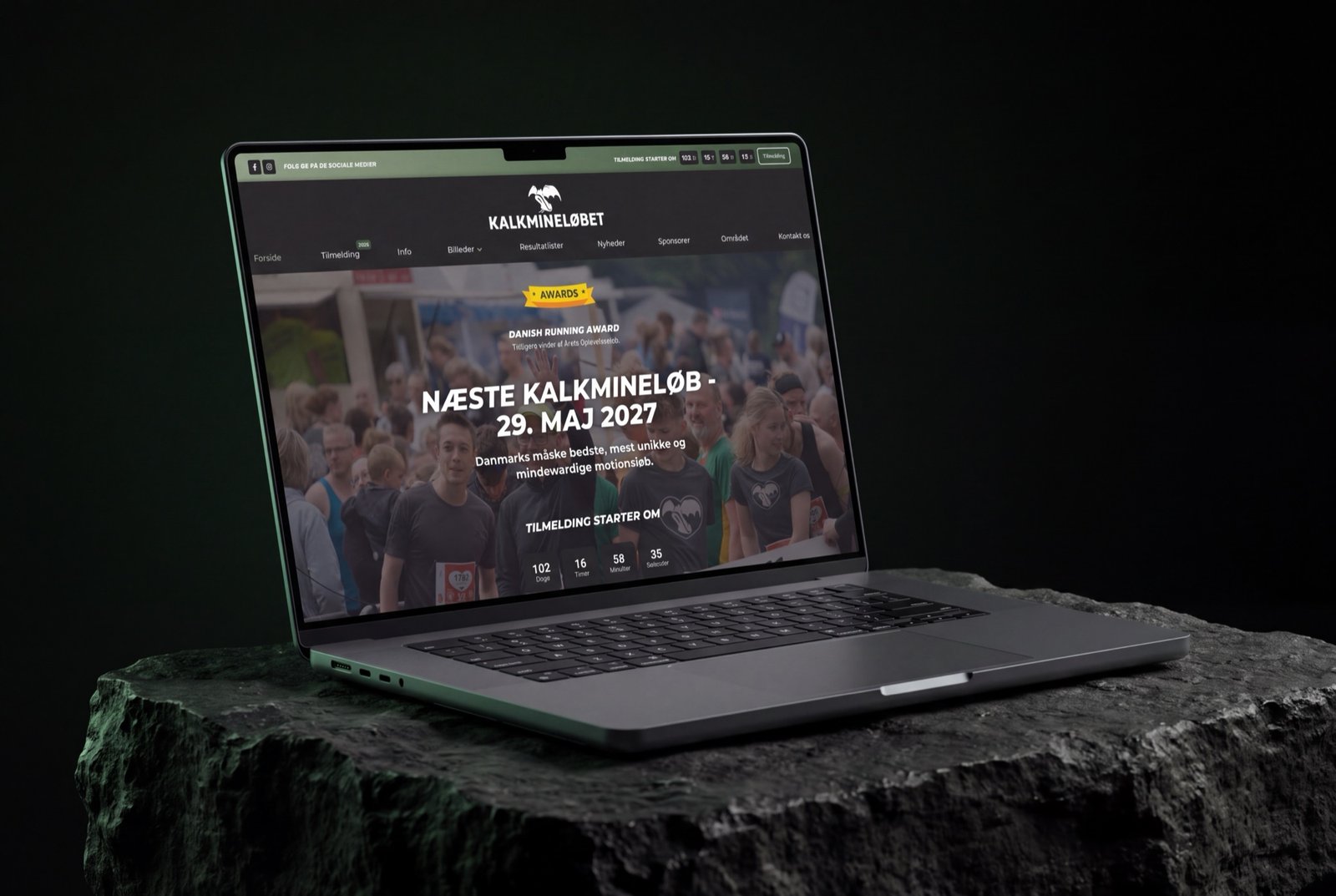 Kalkmineløbet – forside vist på MacBook